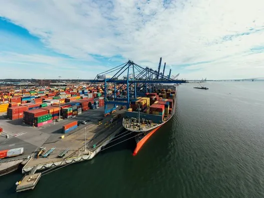 Container port with cranes and a cargo ship – engine and technical parts